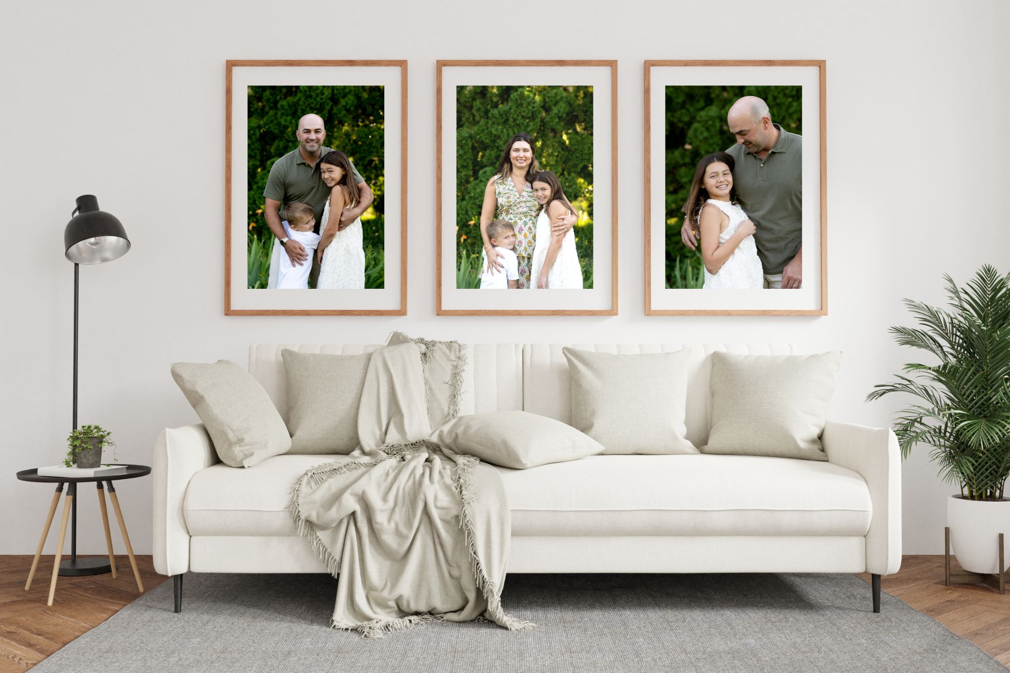 family of four smiling at the camera in a minneapolis public park at golden hour